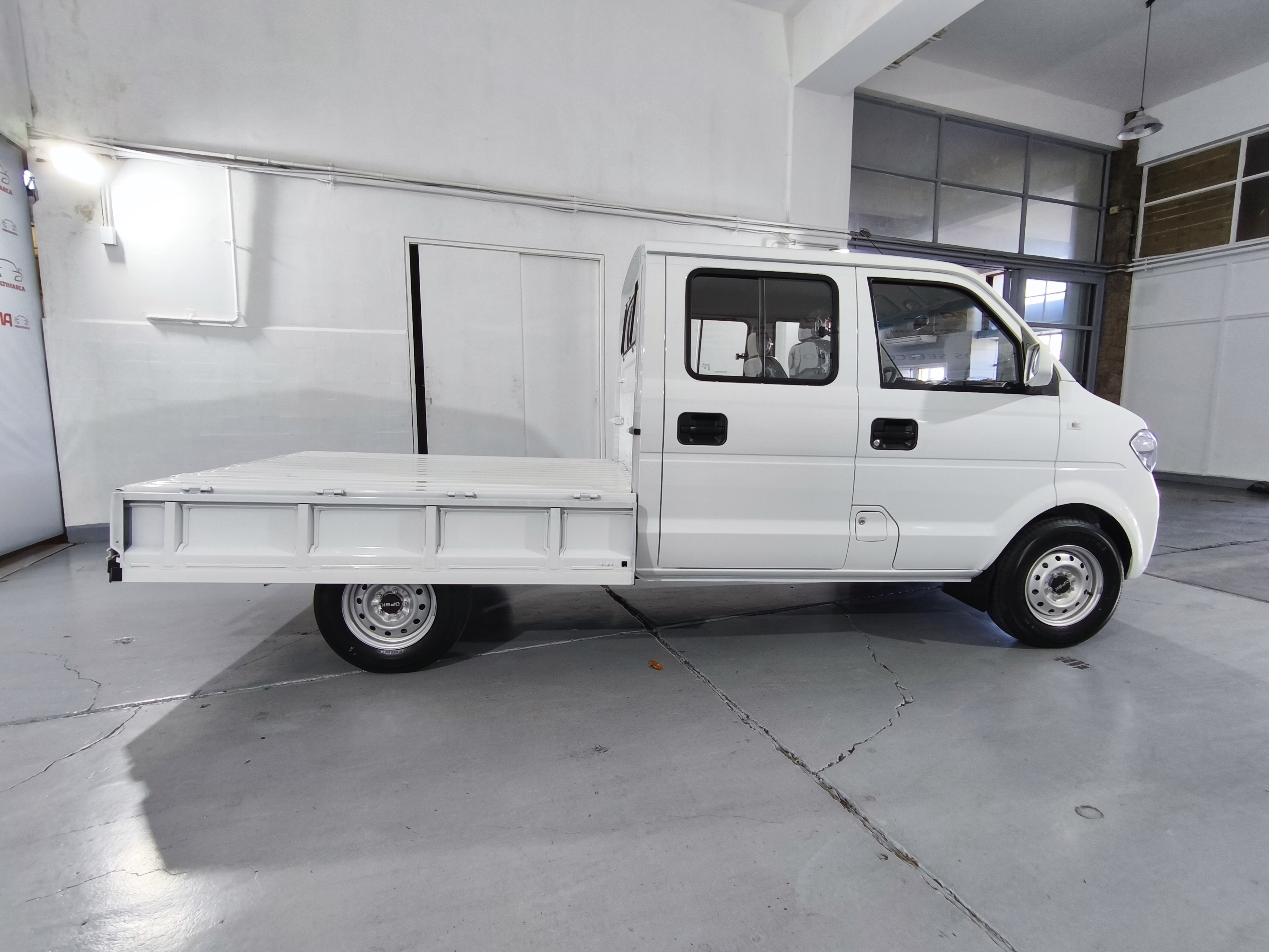 C32 MINI TRUCK CABINA DOBLE 2025